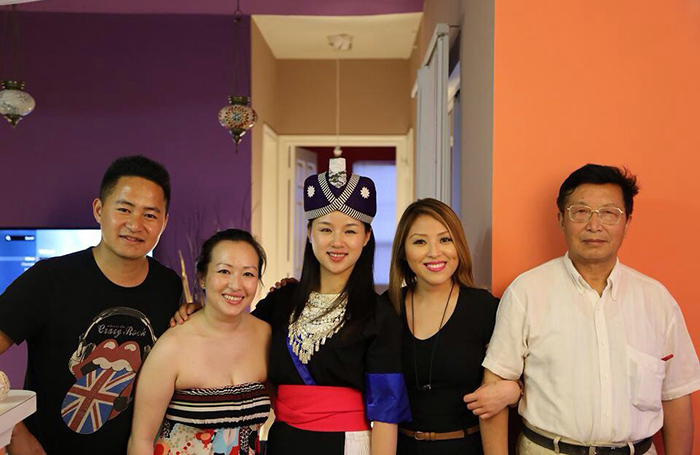 A Hmong and Miao dinner reunion: (l-r) Mo Ming, Sia Vue, Liang Xiaoying, Yer Vue, and Yang Wenbin. 