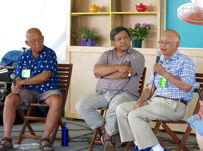 Stan Lou, Ted Gong, and Walter Woo in the Teahouse Commons at the 2014 Smithsonian Folklife Festival. Photo by Sojin Kim