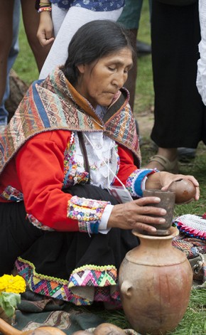 Quintina Huanca Quispe prepares the chicha. Photo by Kadi Levo, Ralph Rinzler Folklife Archives