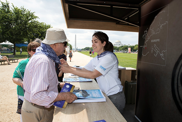 If you start your visit to the Festival at the information booth in the center of our section on the National Mall, you can get a free Smithsonian Folklife Festival kerchief, a Basque festival tradition. Photo by Francisco Guerra, Ralph Rinzler Folklife Archives