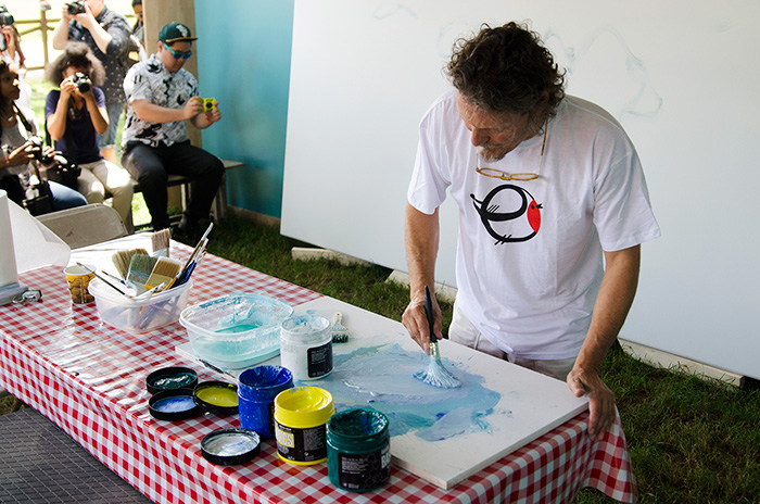 Jesus Mari Lazkano is a renowned landscape painter from the Basque country. Over the course of the Festival, he is painting two eighteen-foot canvases of expansive seascapes. Photo by Josh Weilepp, Ralph Rinzler Folklife Archives