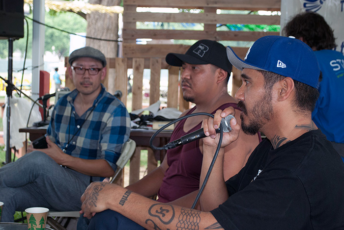 Music journalist Oliver Wang (left) interviewed Ray Guzmán (part of Grupo Nuu Yuku) and Bambu (right) about their individual experiences growing up with hip-hop and starting to rap in The Studio. Photo by J.B. Weilepp, Ralph Rinzler Folklife Archives