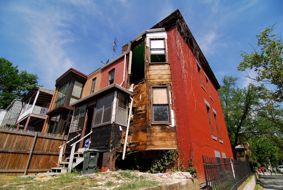 Rehabilitation: sample of decrepit housing in Columbia Heights that is slated for remodeling. Photo by Fernando C. Sandoval, Oak Street Studio