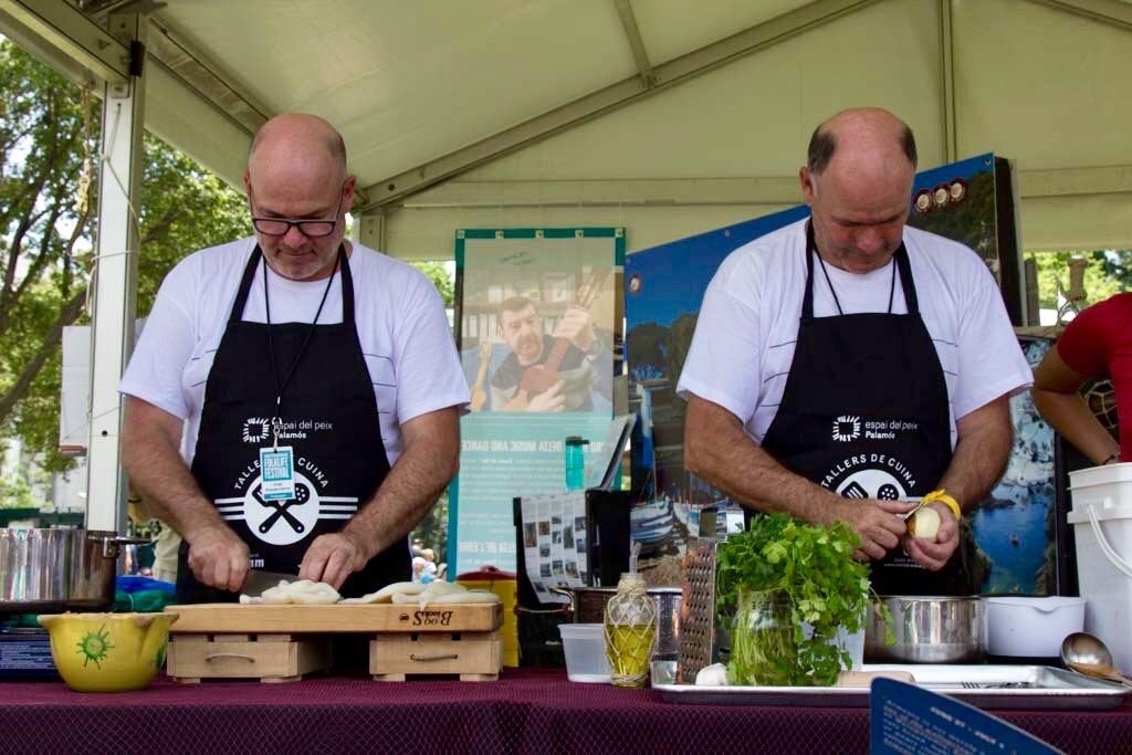 Fishermen Ramón and Félix preparing for their cooking demonstration at the 2018 Smithsonian Folklife Festival