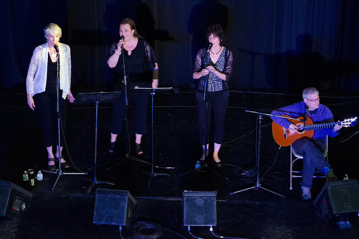 NOKA singers Cathy Petrissans, Andrea Bidart, and Begoña Echeverría were accompanied by Basque guitar player Mikel Markez at the 2016 Folklife Festival. Photo by Josh Weilepp, Ralph Rinzler Folklife Archives