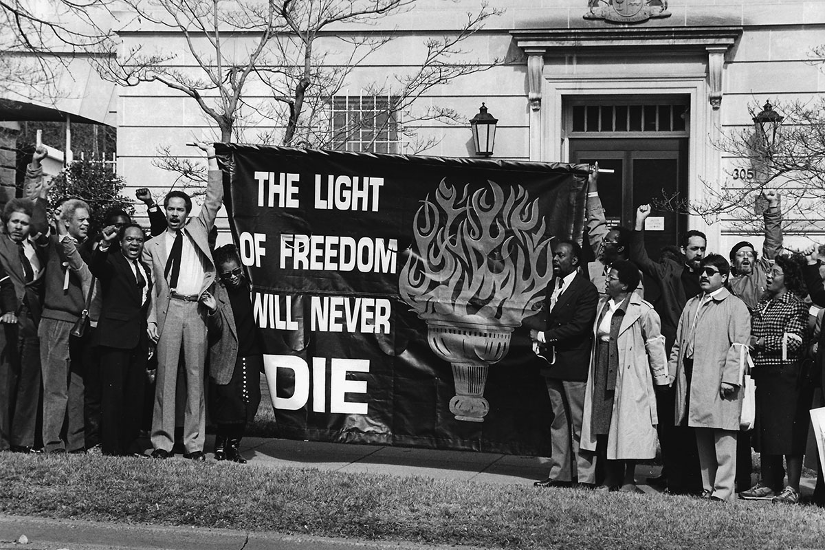 Anti-apartheid protest in Washington, D.C., circa 1984. Photo by Rick Reinhard