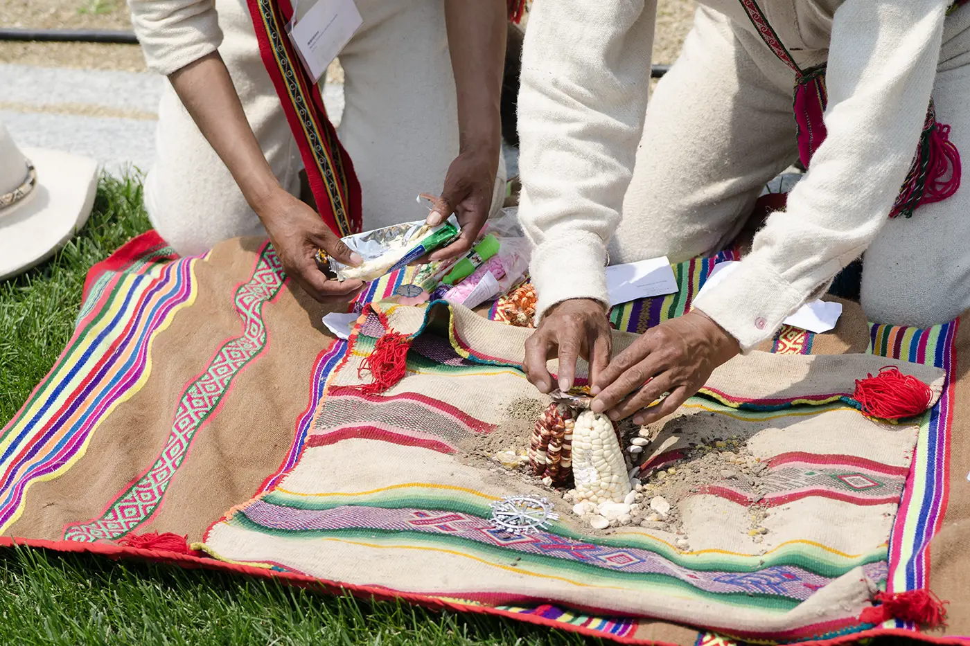 Ritual offerings are made throughout the bridge building process.