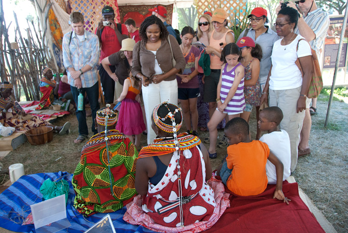 Members of the Ngurunit Basket Weavers Group answer questions from Festival visitors