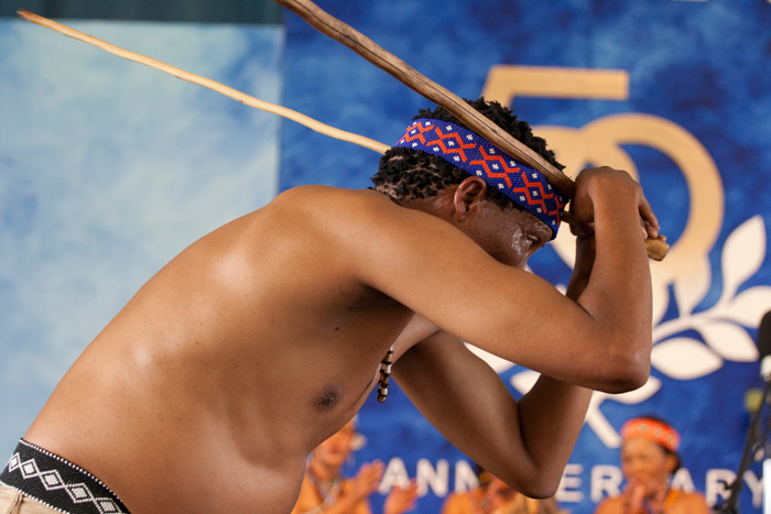 Kuela Kiema performs with the San Dancers from Botswana