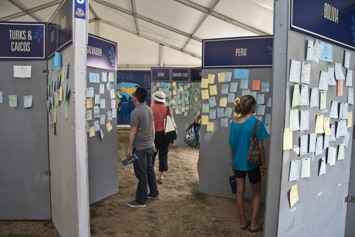 Visitors read the messages exchanged in the RPC Village of the Peace Corps program.