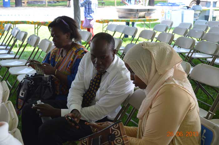 Members of the delegation compare notes after a program. Photo by Elizabeth Ouma, courtesy of the Kenya Cultural Centre