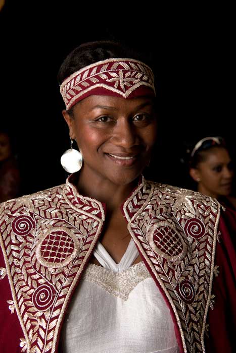 A model from the Wedding Celebrations “cross program” on the Rock the Runway Stage of the <i>Will to Adorn</i> program. Photo by Walter Larrimore, Ralph Rinzler Folklife Archives