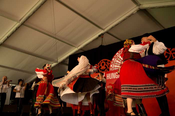 A dance performance during a presentation about fashion and tradition in Kalotaszeg in the <i>Hungarian Heritage</i> program. Photo by Maggie Pelta-Pauls, Ralph Rinzler Folklife Archives