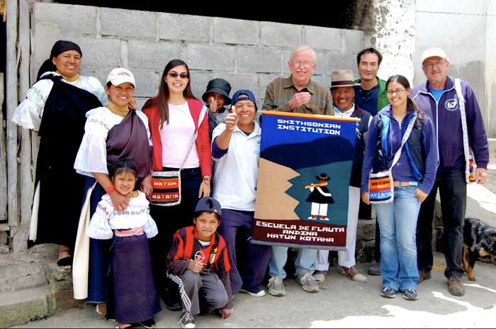 Jessie Vallejo and Smithsonian Folkways staff pose with members of Patricio Maldonado's family. L to R: Rosa Quinchuquí, Yolanda Maldonado, Jessie Vallejo, Ali Rumi Quilumbango, Segundo Maldonado, Dan Sheehy, Mariano Maldonado, Charlie Weber, Cristina Díaz-Carrera, Pete Reiniger; front left: Nina Quilumbango and Malki Quilumbango.