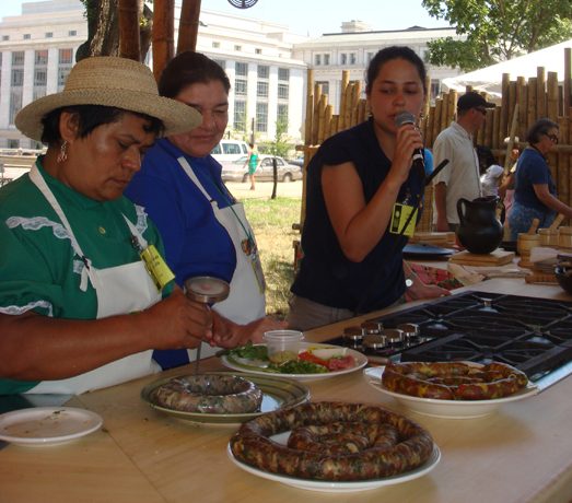 María Florinda demonstrating how to make chorizo on the National Mall during the 2011 Folklife Festival. Photo by Van Luong