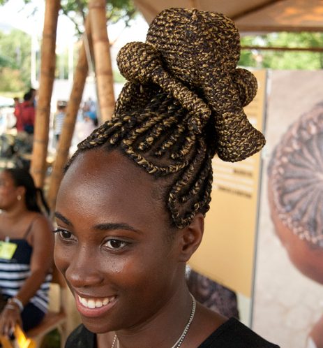 Colombia program intern Christina Obiajulu with hairstyling by Ziomara Asprilla García. Photo by Kathryn Mitchell/Smithsonian Insitution