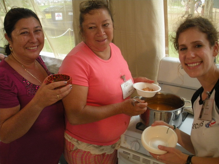  Left to right: Zonia Judith Garcia de Garcia, Reyna Floridalma Alvarado de Ramirez, and Laura Kutner with the finished dish