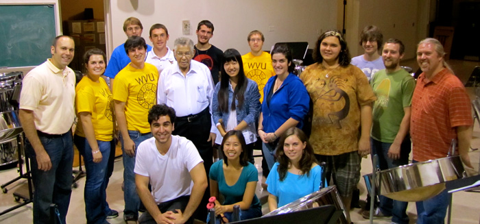 WVU steel drum master Ellie Mannette, white shirt, center, poses with some of his West Virginia University ensemble students.