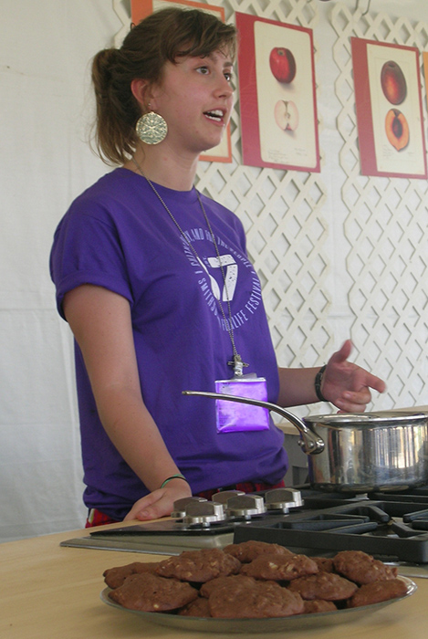 Smithsonian Foodways intern Daisy Zeijlon shows visitors how to bake Honey Chocolate Oatmeal Cookies.