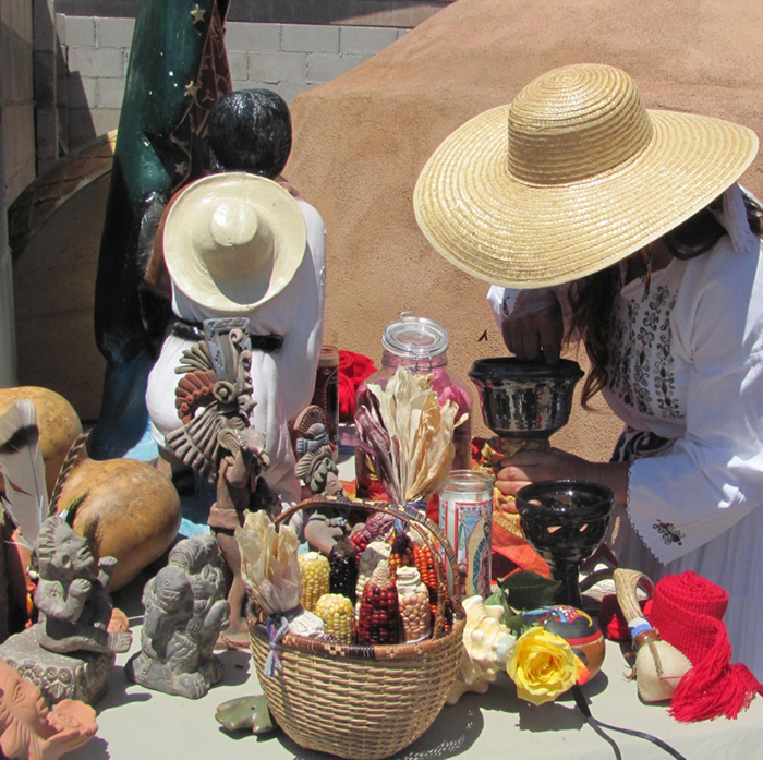 An altar comprised of traditional deities and other sacred tools.