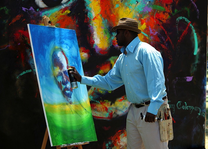 Jay Coleman works on a portrait in the Citified program area. © All rights reserved by grobinette