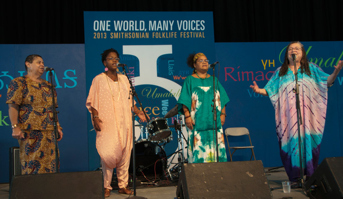 Members of D.C.-area a capella group In Process… perform at the Voices of the World stage on the first night of the 2013 Smithsonian Folklife Festival. Photo by Joe Furgal, Ralph Rinzler Folklife Archives