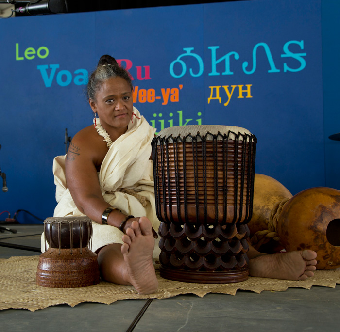 Hawaiian kumu hula Kekuhikuni K. Keali’ikanaka’oleohaililani at the Voices of the World stage, 2013 Folklife Festival. Photo by Maggie Pelta-Pauls, Ralph Rinzler Folklife Archives