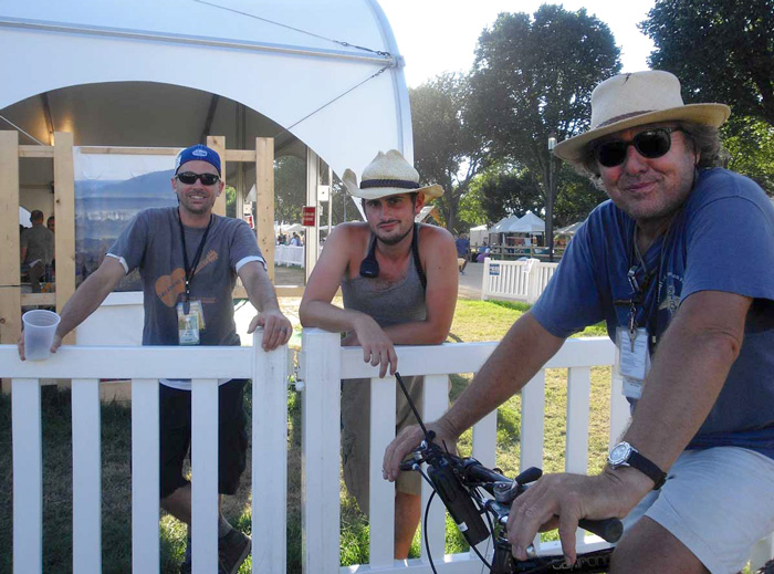 Steve Fisher (on bike) with Jason Morris, warehouse coordinator, and Will Saunders, from the exhibit/technical crew.