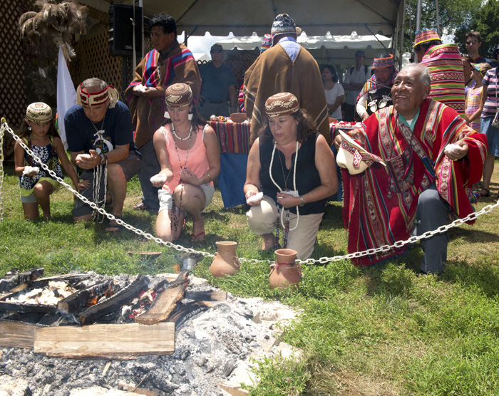 Bud Lane and his granddaughter Halli Chaabayu Lane-Skauge, his daughter Alissa Lane, and his wife Cheryl Lane participate in a blessing ceremony with Kallawaya medicinal practitioner Walter Alvarez Quispe from Bolivia. Photo by Walter Larrimore, Ralph Rinzler Folklife Archives