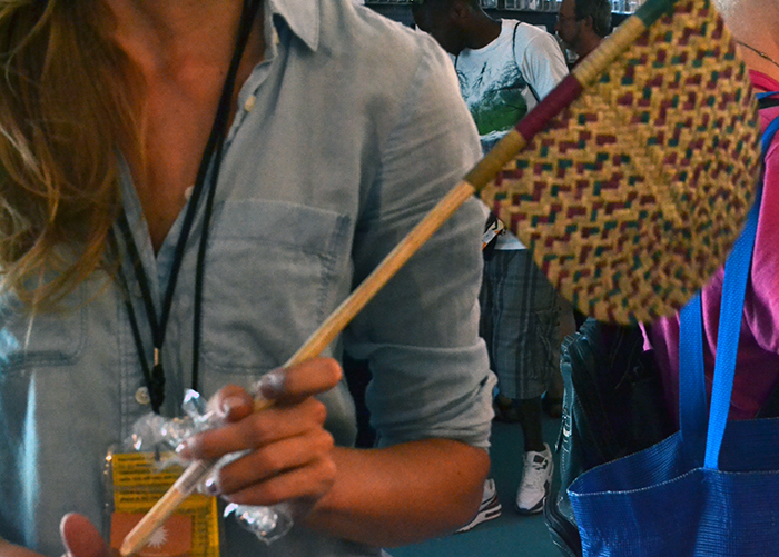 Halle Butvin shows off a palm fan from Pate Island, Kenya.