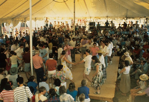 Visitors and participants dancing at the 1989 Folklife Festival.