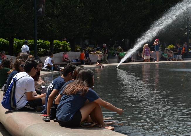 D.C. visitors cool off in the National Art Gallery fountain.