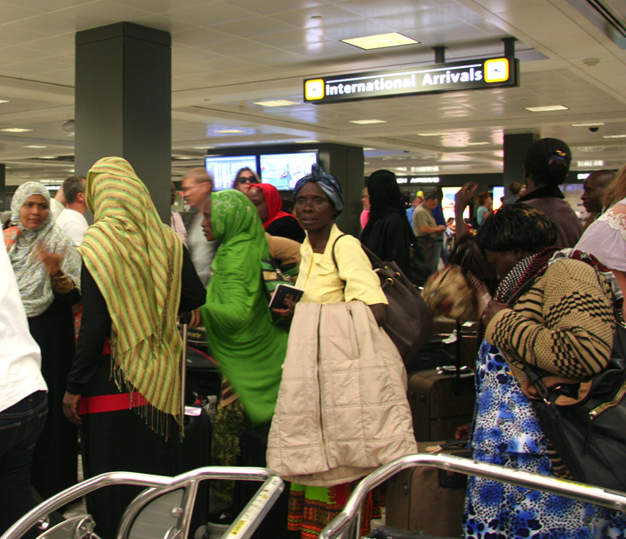 A group of around forty Kenyans arriving at Dulles airport, and my first experience as a travel aid.