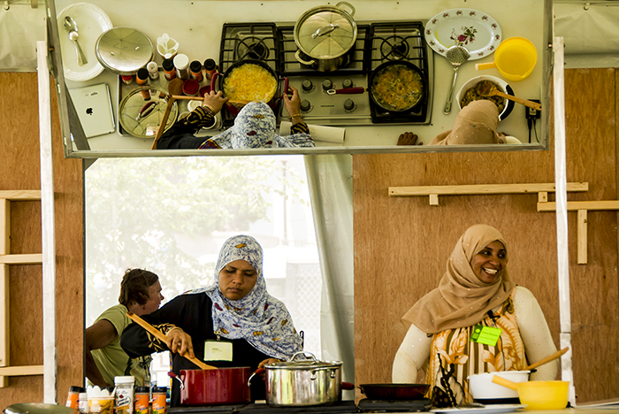 Amina Swaleh and Fatma Busaidy demonstrating at Flavors of Kenya. Photo by Michelle Albeit, Ralph Rinzler Folklife Archives