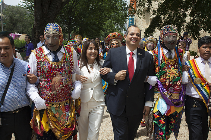 After the presentation in the theater, the Contradanza troupe from Paucartambo processed to the museum's Welcome Plaza, joined by Minister Blanca Magali Silva Velarde-Álvarez and Ambassador Luis Miguel Castilla. Photo by Brian Barger, Ralph Rinzler Folklife Archives