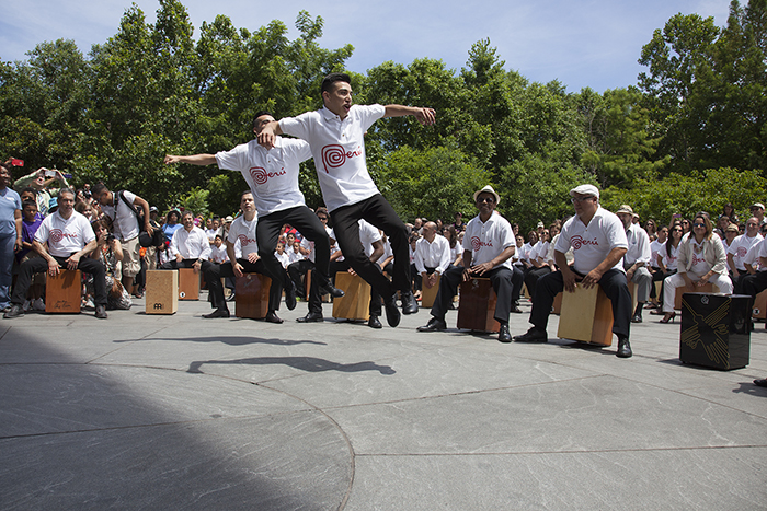 The 100 Cajoneros group took over the Welcome Plaza as a thunderous close to the Opening Ceremony. Photo by Brian Barger, Ralph Rinzler Folklife Archives