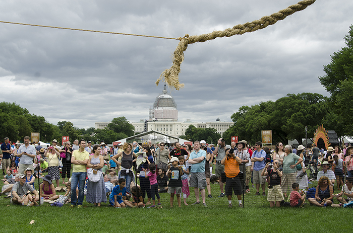 While the Peruvian American performances continued throughout the day, the Q'eswachaka bridge builders stealthily strung their first ropes across the Mall. Check back on the blog for more photos from this first day soon! Photo by Josh Weilepp, Ralph Rinzler Folklife Archives