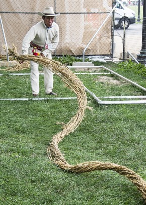 To stretch and tighten their handwoven rope, the Q’eswachaka bridge builders twirled it in wide circles. Photo by Willa Friendman, Ralph Rinzler Folklife Archives