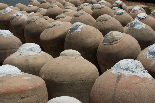 Pisco stored in handmade clay pots. Photo courtesy of Flickr user Dave Canon
