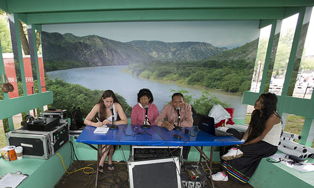 Radio Ucamara "broadcasting" in their booth on the National Mall. Photo by Francisco Guerra, Ralph Rinzler Folklife Archives 