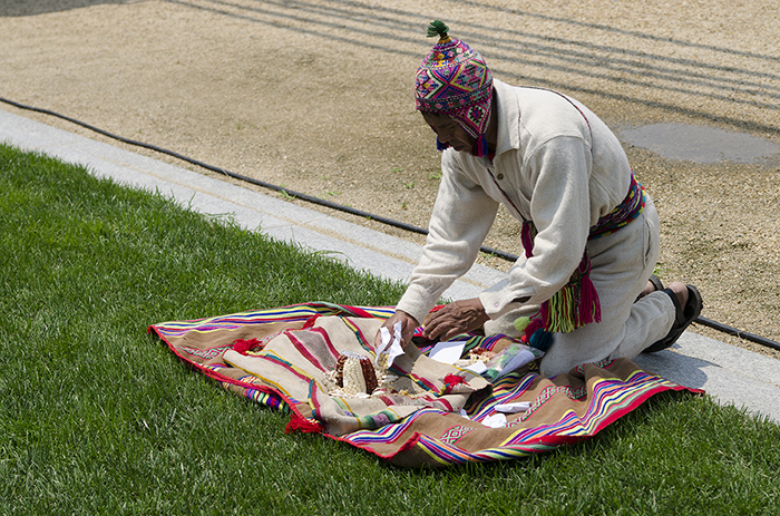 Bridge builders performed a second offering, asking for continued success in the building of the Q’eswachaka bridge. Photo by Josh Weilepp, Ralph Rinzler Folklife Archives