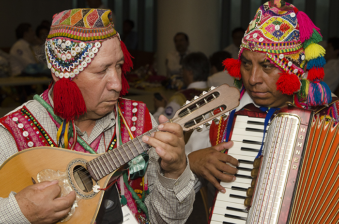 Mario Palomino Coll Cárdenas played the stringed <em>bandurria</em> in the participant green room. Photo by Josh Weilepp, Ralph Rinzler Folklife Archives </em>