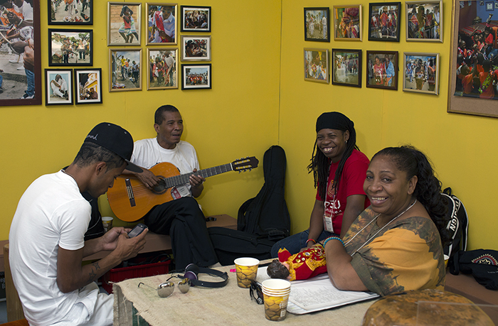 Members of Tutuma also took a break in their tent, a replication of the Ballumbrosio family living room. Photo by Pruitt Allen, Ralph Rinzler Folklife Archives