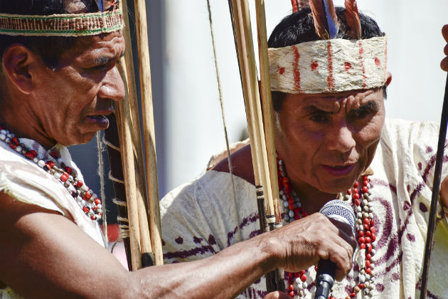 Wachiperi archers prepare their arrows for a demonstration at the Folklife Festival. Photo by Ronald Villasante, Ralph Rinzler Folklife Archives