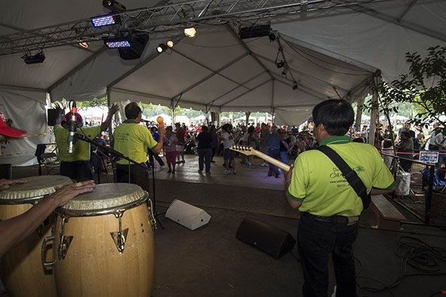 Los Wembler's de Iquitos performed at La Juerga Stage, right next to El Fogón Kitchen at the Festival. Photo by Ronald Villasante, Ralph Rinzler Folklife Archives