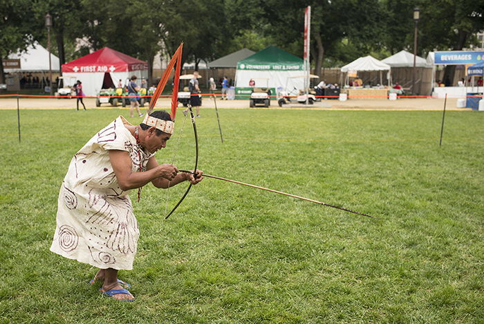 Sergio Pacheco Habeo demonstrated how Wachiperi archers hunt small game. Photo by Vivianne Peckham, Ralph Rinzler Folklife Archives