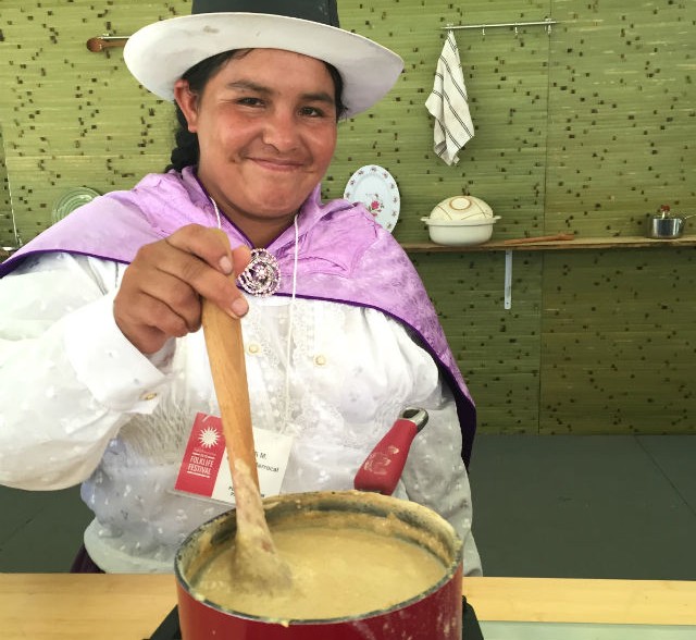 Ana María Ccahuin Berrocal, from the La Chacra: Quinoa Farming group, prepared <em>mazamorra de quinua</em> at the Folklife Fesival. Photo by Erin Kurvers