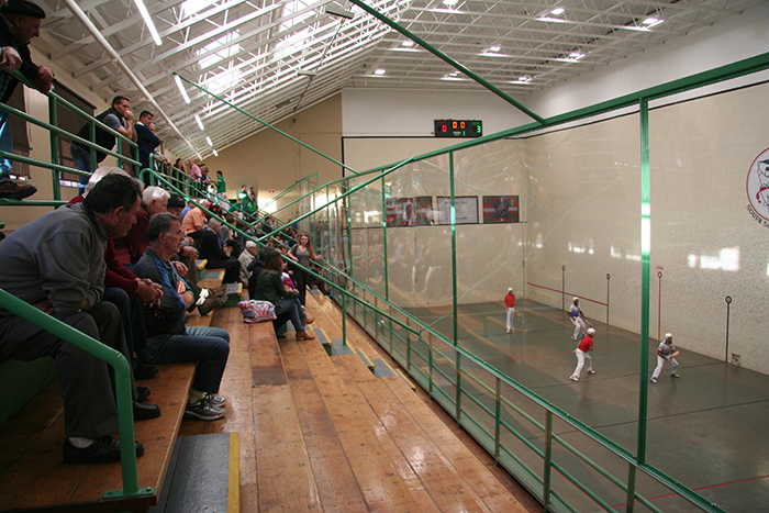 Crowds watch a <i>paleta cuera</i> game in the San Francisco Basque Cultural Center's <i>frontón</i>. Photo by Elisa Hough, Ralph Rinzler Folklife Archives