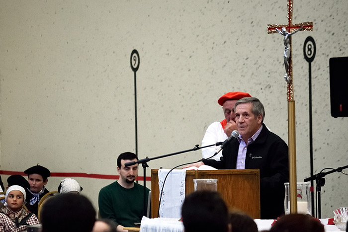 Martin Goicoechea performs a <em>bertso</em> during a Sunday morning mass in the San Francisco Basque Cultural Center. Photo by Greyson Harris, Ralph Rinzler Folklife Archives