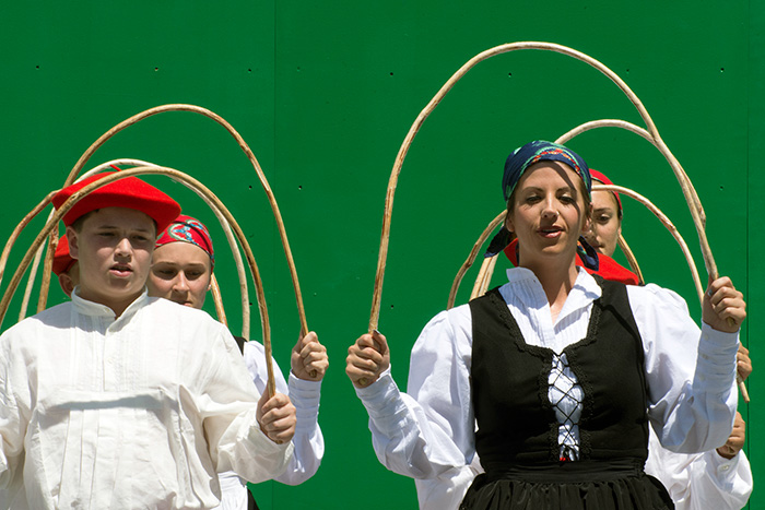 Young members of Gauden Bat, the traditional dance troupe from the Chino Basque Club in Southern California, performed at the Frontoia stage. Photo by Ronald Villasante, Ralph Rinzler Folklife Archives